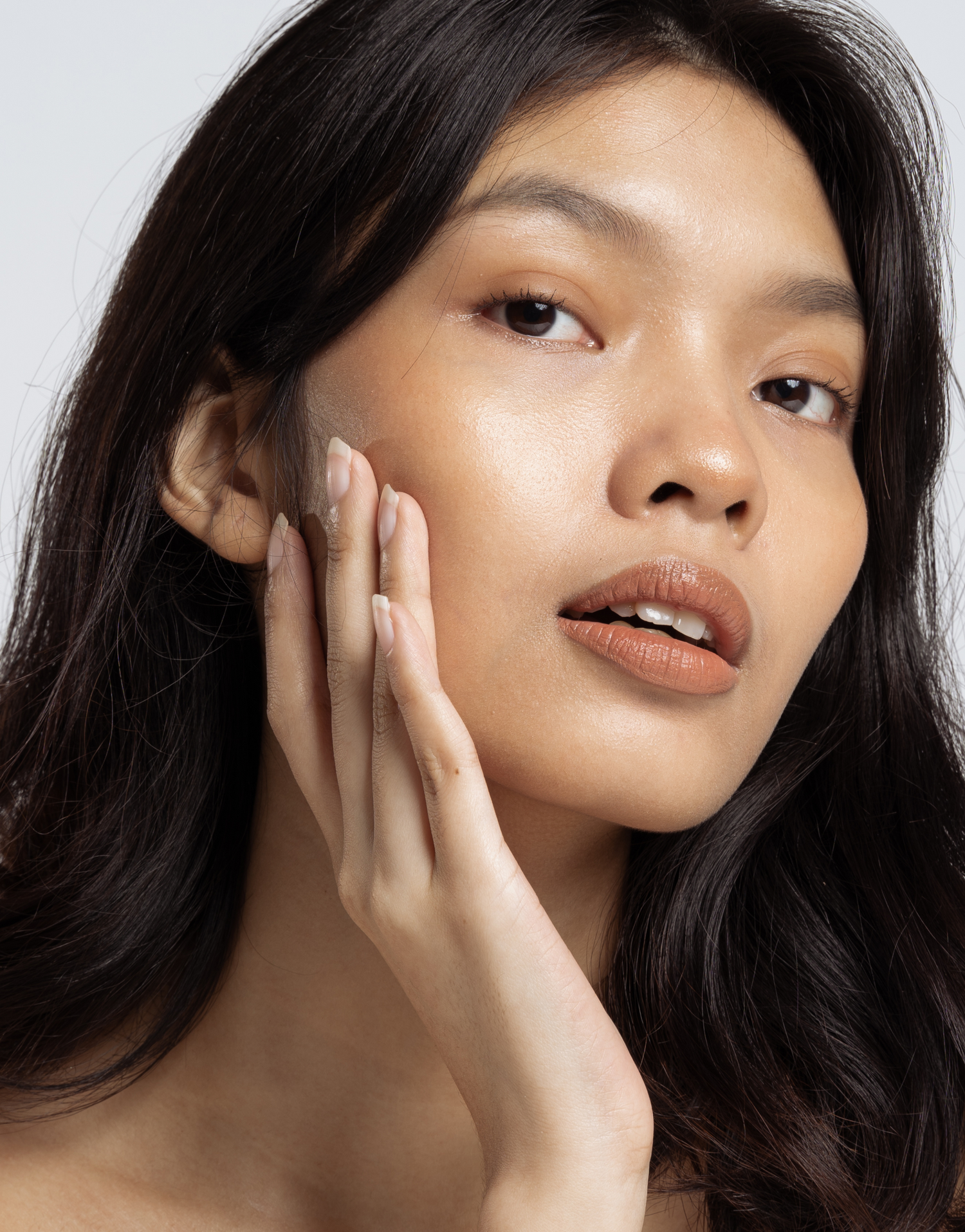 Model touching face