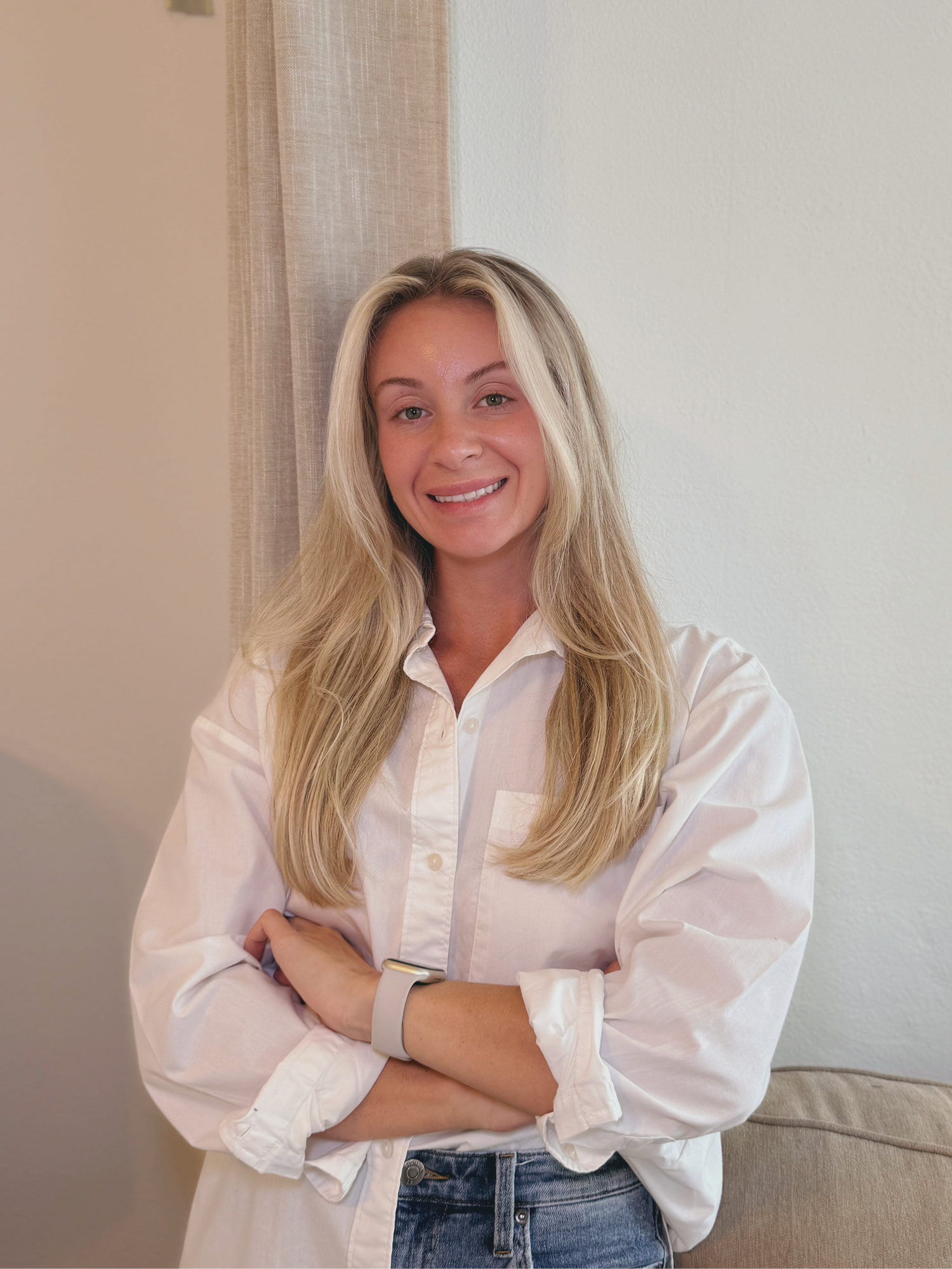 Indie Beauty Branding Co-Founder in a button down with a neutral background