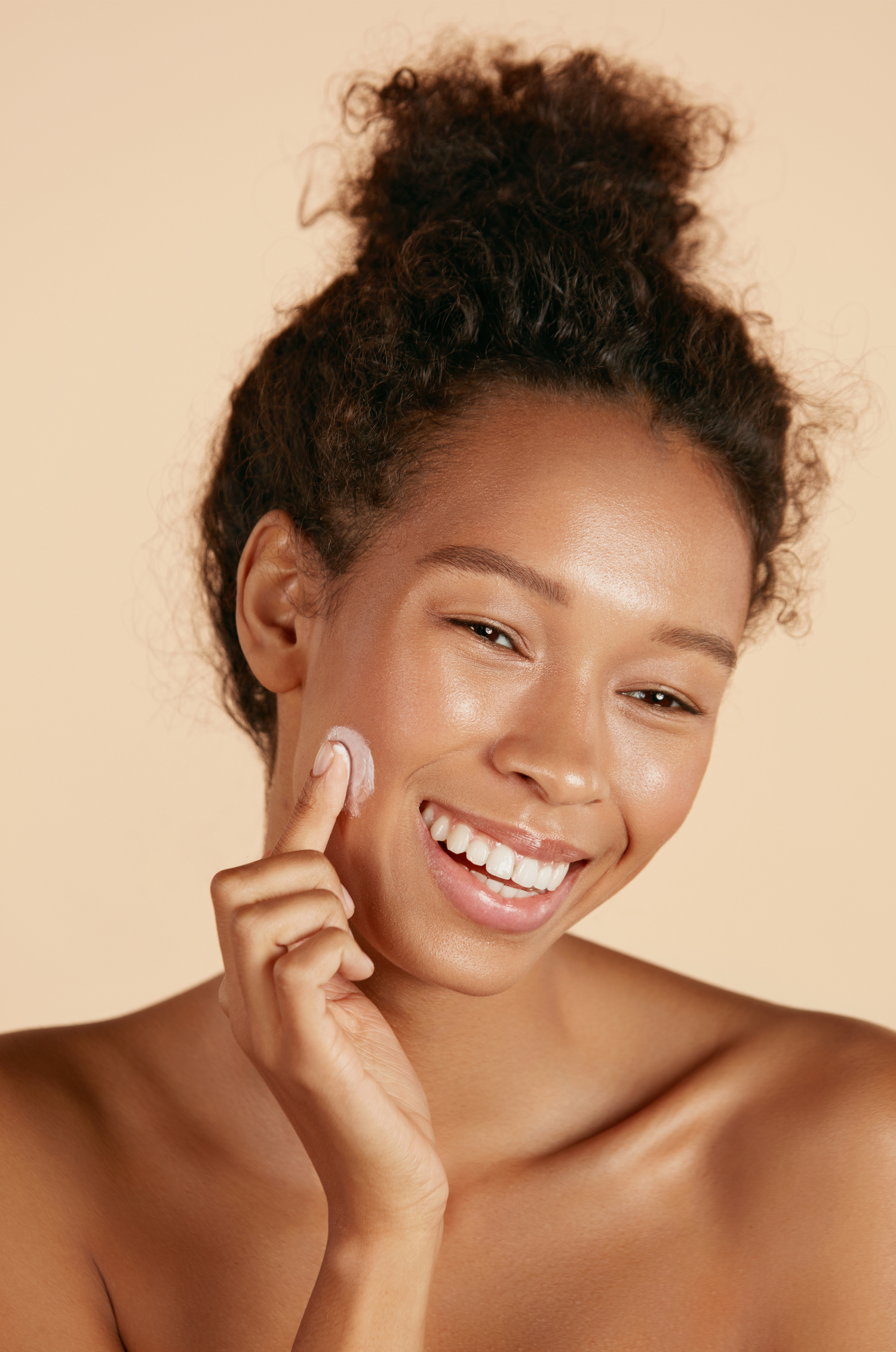 Model applying product on face